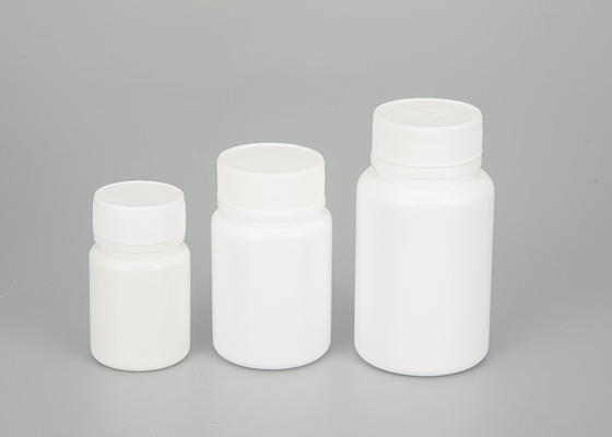 ねじ帽子30ml 60ml 100mlが付いている白い空のプラスチック薬のびん