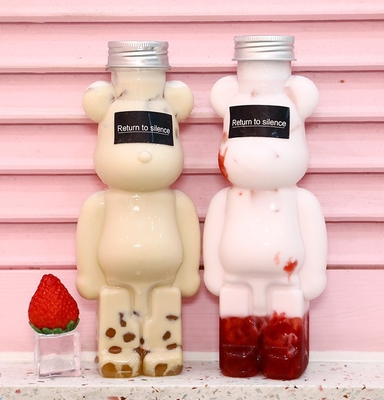 カスタマイズ可能なプラスチック製のミルクティーボトルジグ 蓋とハンドルに螺栓付き