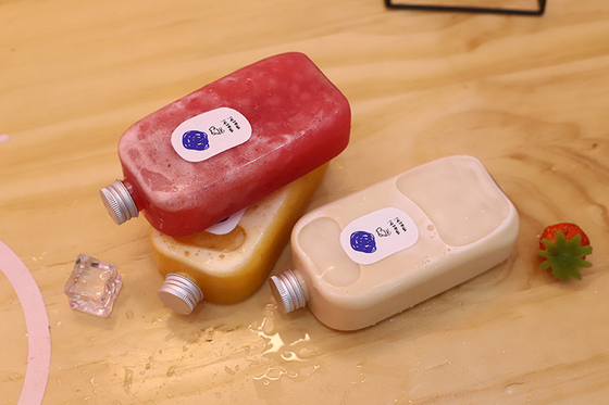 スクエアと丸い 透明な飲み物 漏れ防止の螺栓付きのミルクティーボトル