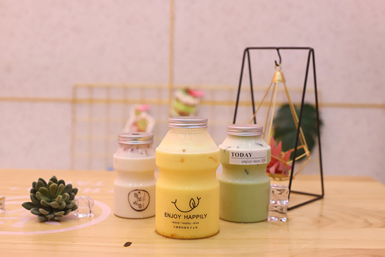 漏れ防止のプラスチック製のミルクティーボトル 蓋に螺栓付き 耐久性のあるBPAフリー素材