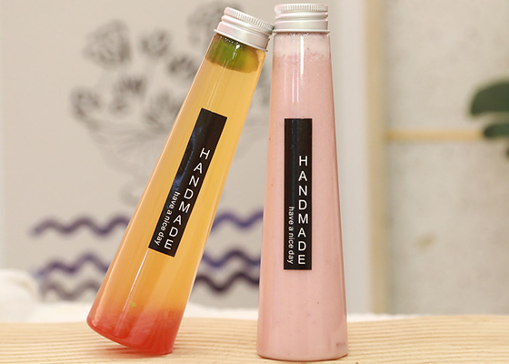 ふた7oz 200mlが付いている円錐清涼飲料プラスチック ジュースのびん