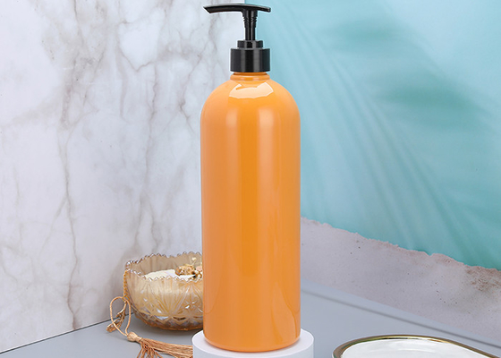 25mmのオレンジ シャンプー プラスチック ポンプ ディスペンサーは900mlをびん詰めにする