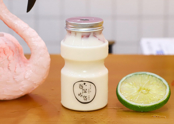 SGSの穴カバー帽子350ML 500ML 700MLが付いている空のプラスチック ミルクの茶ペットびん